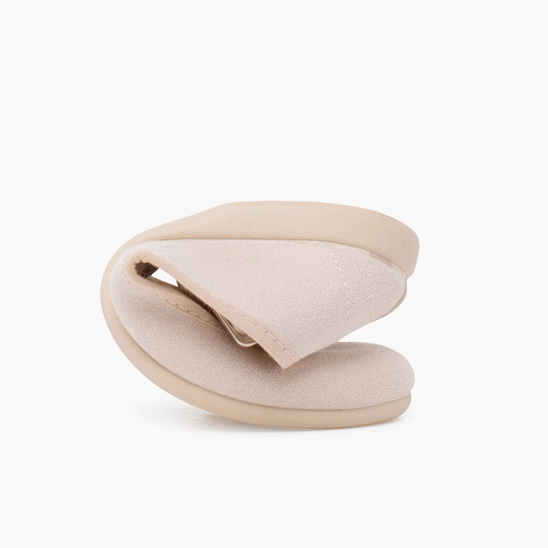 Beige sandal on a white background