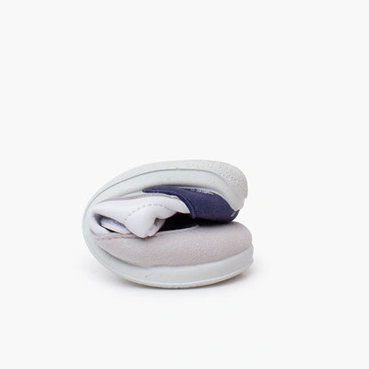 Gray and white slippers on a white background