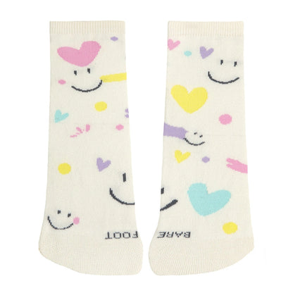 Pair of socks with smiley faces and colorful hearts on a white background