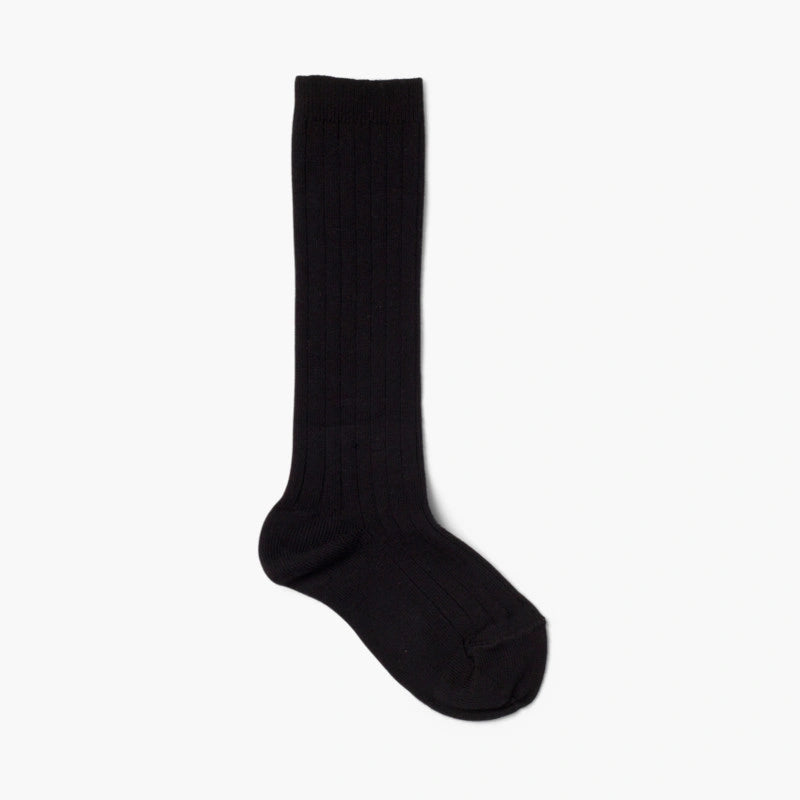 Black knee-high sock on a white background