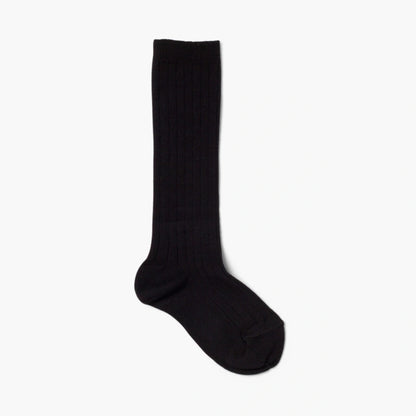Black knee-high sock on a white background