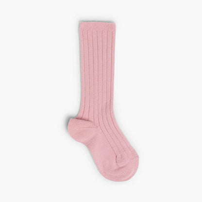 Pink knee-high sock on a white background