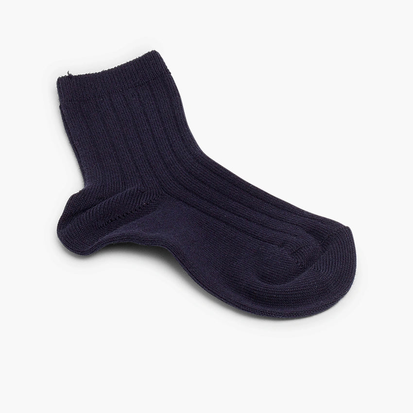 Navy blue sock on a white background