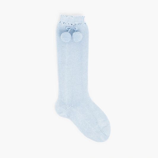 Light blue knee-high sock with white paw prints on a white background