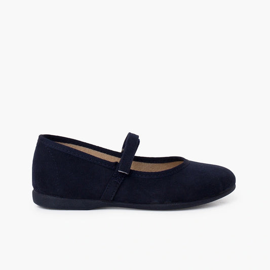 Navy blue shoe with a strap on a white background