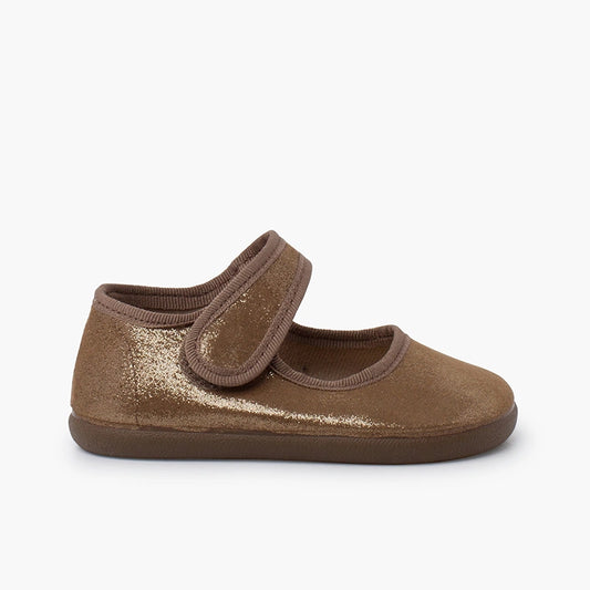 Brown children's shoe with a strap on a white background