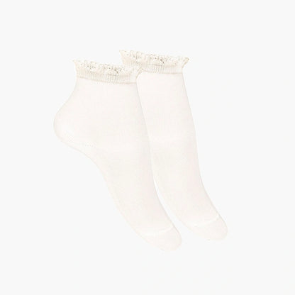 Beige socks with lace top on a white background